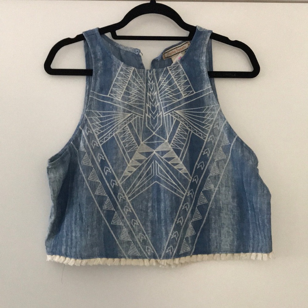 Graphic top with fringe details